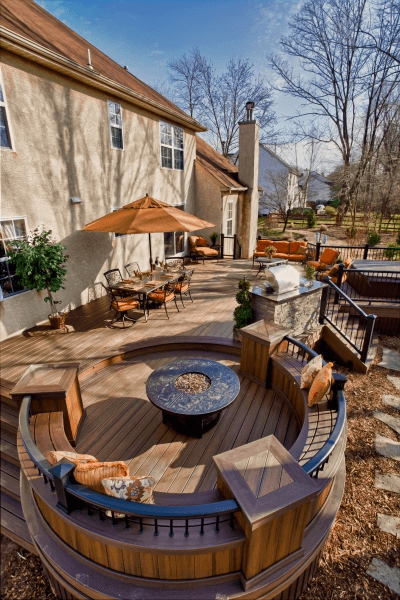 Deck with fire pit and round seating area
