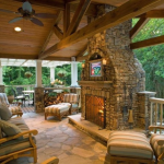 Covered Deck with Custom Stone Fireplace- Amazing Deck